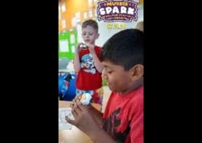 Muskie SPARK Camping/Outdoor afternoon enrichment class making s’mores!